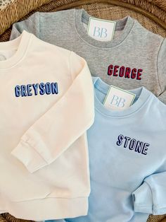 Unisex children's sweatshirts personalized with your choice of name or monogram.       Available with name centered on chest or smaller name/monogram on left chest in your choice of font and color       100% cotton    Naturally Tapered Shoulder    True to Size    Ribbed Neckline