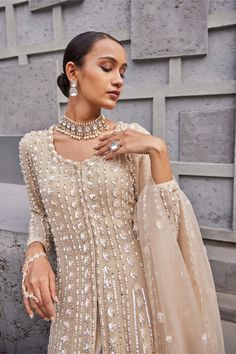 Nidhika Shekhar | Beige Golden Maharani Lehenga Set | INDIASPOPUP.COM Beige Lehenga, Anarkali Patterns, Golden Lehenga, Cape Lehenga, Brocade Lehenga, Sequin Cape, Formal Chic, Indian Wedding Gowns, Indian Lehenga Choli