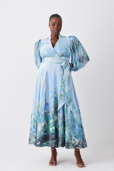 Bringing The Beauty Of Summer To The Forefront, Look To The By Lydia '23: Mediterranean Reverie Edit For Both Holiday Investments And Instant Formalwear Classics.Enhanced With Serene Blue Shades And A Picturesque, Meadow-Inspired Print, This Maxi Dress Makes An Idyllic Wedding Guest Outfit. Exaggerated Balloon Sleeves Add A Level Of Drama, While An Intricate Floral Print Provides An Elegant Finish. This Piece Is Crafted With A Luxurious Cotton-Silk Blend, Giving It A Soft Feel.Floral Printsash B Plus Size Mother Of The Bride Dresses, Australian Dresses, Lydia Millen, Mum Style, Mother Of The Bride Outfits, Plus Size Wedding Guest Dresses, Latest Maxi Dresses, Maxi Dress Collection, Mum Fashion