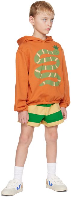 Garment-dyed GOTS-certified organic cotton French terry hoodie. · Graphic printed at front · Elasticized hem and cuffs · Logo flag at side seam · Machine-wash Supplier color: Brown Model measures 48” / 121.9 cm tall and wears size 8. TINYCOTTONS Size: child's height 2: 36 / 92 cm 3: 38.5 / 98 cm 4: 41 / 104 cm 6: 45.5 / 116 cm 8: 50.5 / 128 cm 10: 55 / 140 cm 12: 60 / 152 cm Snake Hoodie, Snake Graphic, Hoodie Graphic, French Terry Hoodie, Tiny Cottons, French Terry, Kids Fashion, Kids Shop, Organic Cotton