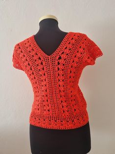 Spring Crochet V-neck Top, Orange V-neck Top For Festivals, V-neck Crochet Tops For Spring, Bohemian V-neck Blouse With Crochet Lace, Crochet Lace V-neck Top, Orange Crochet Bohemian Top, Red Crochet Bohemian Top, Bohemian Fitted V-neck Crochet Top, Red Crochet Sleeveless Top