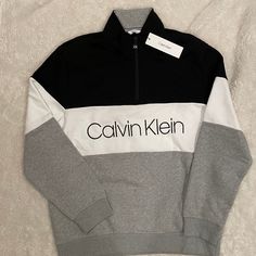 Brand New - Mens Calvin Klein Logo Sweatshirt Size: Mens Usa X-Large Color: Gray, White And Black Colorblock 1/4 Zip; Warm, Soft Touch Fleece Inside Smoke Free, Pet Free Home If You Are New To Poshmark Save $10 Off This Purchase! When You Sign Up, Enter Code: Nana_cherie Calvin Klein Men, Athletic Wear, Zippered Jacket, Sports, Casual Men Athletic Wear, Mens Calvin Klein, Ck Calvin Klein, Logo Sweatshirt, Calvin Klein Men, Zipper Jacket, Athletic Wear, 1/4 Zip, Mens Sweatshirts