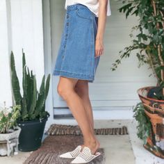 Add a touch of vintage charm to your wardrobe with the Anna-Kaci Women's Button Up A-line Vintage Skirt. This cute jean skirt features a comfortable fitted cut that hugs the hips just right, thanks to the perfect blend of stretch, coupled with a flattering flare hem, making it a must-have for any trendy fashion wardrobe. Spring Denim Blue Skirt With Buttons, Summer Medium Wash Skirt With Button Closure, Denim Blue Mid-rise Skirt With Button Closure, Mid-rise Denim Blue Skirt With Button Closure, Denim Blue Bottoms With Button Closure For Day Out, Dark Wash Bottoms With Button Closure For Day Out, Spring Button-up Medium Wash Skirt, Casual Knee-length Buttoned Denim Skirt, Spring Denim Skirt With Button Closure Medium Wash