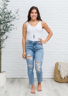 Product description: You'll be the talk of the town in these Florence High Waist Destroyed Boyfriend Jeans! Crafted with Judy Blue 4-Way Stretch fabric, they offer a high rise and distressing throughout both legs. The boyfriend fit is fitted through the thighs and slightly loose below the knee for an effortless look. With five pocket cut and zipper fly, you can easily dress up or down with these jeans. Get ready to rock them all season long! Embroidered Pocket, Relaxed Jeans, Judy Blue Jeans, Classic Jeans, Hottest Fashion Trends, Denim Branding, Dress For Success, 4 Way Stretch Fabric, Boyfriend Fit