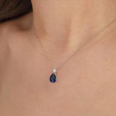 Introducing our exquisite Teardrop Blue Sapphire Solitaire Necklace, a delicate and elegant piece designed for the modern bride. Crafted with meticulous attention to detail, this necklace features a captivating teardrop-shaped blue sapphire, expertly set in a dainty 14K gold pendant. #WomenNecklace #WomenPendant #PearCutNecklace #GemstoneNecklace #DiamondNecklace #SapphireNecklace #DaintyNecklace #MinimalistNecklace #SolitaireNecklace #StatementNecklace #WeddingNecklace #BridalJewelry #GiftHer Elegant Sapphire Drop Necklaces, Classic Sapphire Necklaces For Weddings, Elegant Sapphire Pear-shaped Necklace, Classic Sapphire Necklace For Wedding, Blue Teardrop Drop Necklace For Formal Occasions, Elegant Pear-shaped Sapphire Necklace, Formal Blue Teardrop Drop Necklace, Elegant Teardrop Sapphire Necklaces, Elegant Sapphire Teardrop Necklace