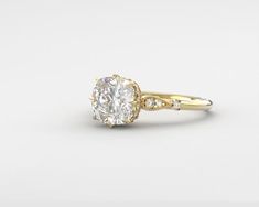 This is an elegant Cushion solitaire ring design with a hidden halo of diamonds and an antique style where the top resembles floral petals holding the center Moissanite.  I used a large 3ct diamond equivalent custom cut moissanite with an under halo of diamonds for the top head flanked by diamonds surrounded by milgrain on a slim dainty band.Ring Features:* Center Stone: Choose from approx. 8mm Cushion brilliant cut; -Ritzy Moissanite colorless, -Neo moissanite colorless-Charles & Colvard Fo Cushion Solitaire Ring, Solitaire Ring Designs, Antique Diamond Ring, Engagement Ring Cushion, Cushion Solitaire, Dainty Band, Ring Cushion, Engagement Rings Cushion, Antique Diamond Rings