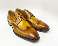 Style: 509-43T-Tan/Cognac Extremely comfortable, this Exquisite new lace-up Wingtip Blucher Oxford from our Maurice collection in Hand Burnished Two-Tone Leather features a Wingtip Design, Decorative Perforations and Pinking Detail, and a clean, stitched welt! Fitted Brown Lace-up Oxfords, Cordovan Shoes, Shoe Horn, Shoe Tree, Horse Hair, Suede Shoes, Shoe Box, Lace Up Shoes, Leather And Lace