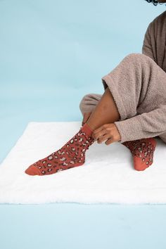 **This product is shipped by a third party warehouse within the US and may arrive separately from your complete order. introducing our Leopard Knit Socks! These cozy and comfy socks are perfect for lounging around the house or adding a touch of fun to your everyday outfit. The leopard print is unique and eye-catching, sure to add a touch of personality to any outfit. The soft, stretchy fabric is comfortable and will keep your feet warm all day long. Whether you're looking for a gift for a animal Cozy Socks For Stocking Stuffer, Comfortable Cozy Socks For Stocking Stuffers, Cozy One Size Socks For Stocking Stuffer, Casual Soft Knit Socks For Stocking Stuffers, Comfortable One Size Socks For Stocking Stuffers, Cozy Cotton Socks With Comfortable Fit, Comfortable Cozy Cotton Socks, Snug Fit Socks For Fall Loungewear, Cozy Brown Socks For Stocking Stuffers