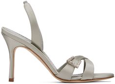 Handcrafted satin heeled sandals in gray. · Open toe · Crystal-cut hardware at criss-crossing straps · Partially elasticized slingback strap · Logo patch and perforated detailing at lambskin footbed · Covered stiletto heel with rubber injection · Nubuck sole · Heel: H3.25 Supplier color: Medium grey Elegant Heels With Heel And Cross Straps, Elegant Formal Sandals With Cross Strap, Elegant Sandals With Cross Straps, Elegant Cross Strap Sandals, Silver Manolo Blahnik Heels, Luxury Heels With Silver-tone Hardware, Luxury Heels With Silver-tone Hardware And Pointed Toe, Silver Kitten Heels With 4-inch Heel, Silver Open Toe Slingback Pumps With 4-inch Heel