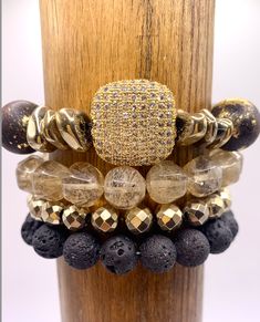 Beautiful Wooden Beads with Gold Accents Irregular Pyrite With Square Cz Bead. Lemon Quartz Bracelet Round faceted Gold Hematite Bead Round Black Lava Rock Bead Luxury Beaded Rondelle Bracelets, Luxury Rondelle Gemstone Bead Bracelets, Spiritual Rondelle Beaded Bracelet With Spacer Beads, Luxury Beaded Bracelets With Faceted Beads, Luxury Faceted Beaded Bracelets, Luxury Adjustable Bracelet With Faceted Beads, Luxury Adjustable Bracelets With Faceted Beads, Luxury Adjustable Rondelle Beaded Bracelets, Gold Rondelle Gemstone Beaded Bracelets