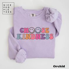 Choose Kindness Sweatshirt, Comfort Colors Sweatshirt, Retro Teacher Shirt, Positive Affirmation Mental Health Self Growth Be Kind Shirt Tee Our graphic sweatshirts are very soft, very cute and bound to keep you warm in the colder months. It's a pre-shrunk, classic fit sweater made with air-jet spun yarn for a soft feel.  ► SHIRT DETAILS The Comfort Colors® sweatshirts are UNISEX - they are meant to have a relaxed fit, please refer to the size chart for more details. Luxurious comfort and style are what this unisex, garment-dyed sweatshirt is all about. It's made with 80% ring-spun cotton and 20% polyester and the fabric is 3-end garment-dyed, ring-spun, color-blast fleece with a 100% cotton face. Each sweatshirt comes with a relaxed fit, a rolled-forward shoulder, and a back neck patch. Purple Crew Neck Top With Letter Print, Purple Letter Print Crew Neck Top, Purple Crew Neck Top With Text Print, Basic Long Sleeve Tops With Screen Print, Purple Long Sleeve Top With Graphic Print, Trendy Purple Sweatshirt With Graphic Print, Purple Relaxed Fit Slogan Top, Trendy Long Sleeve T-shirt With Funny Print, Purple Cotton Sweatshirt With Graphic Print