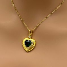 Only One In Stock. Stunning. Bright Gold Tone Metal. Clear Cubic Zirconia Detailing. Green Heart Shaped Zirconia. Necklace Is 16-18 Inches Cross Choker, Gold Starburst, Snowflake Necklace, Vintage Beads Necklace, Zirconia Necklace, Silver Pearl Necklace, Round Pendant Necklace, Green Heart, Cultured Pearl Necklace