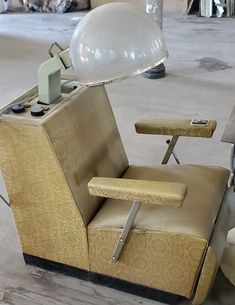 a chair with a lamp on top of it in a room that is being renovated