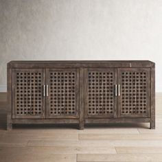 an old wooden cabinet with lattice design on the doors and drawers is shown in front of a white wall