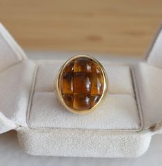 Vintage Designer Ring, Mosaico Pomellato, Pomellato Ring, 18k Gold and citrine ring, vintage fashion ring, woman fashion ring, estate ring, birthday Ring, Citrine Ring, 18k gold, unisex ring, US ring, gift for her, rare vintage ring, Cocktail ring. This is a signed Pomellato Mosaico model ring. This vintage ring is crafted in 18-carat gold and adorned with citrines. The citrines, skillfully cut to create a checkerboard pattern, inspired the name of this ring model. Please note that this model is Formal Yellow Gold Cabochon Sapphire Ring, Formal Cabochon Signet Ring, Formal Fine Jewelry Signet Ring With Cabochon, Luxury Cabochon Signet Ring For Formal Occasions, Formal Heirloom Gemstone Dome Ring, Formal Heirloom Dome Ring With Gemstone, Timeless Dome Ring With Gemstone For Formal Occasions, Heirloom Gemstone Dome Ring For Formal Occasions, Formal Fine Jewelry Cabochon Ring