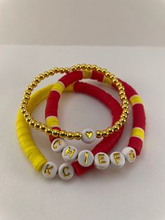 Kansas City Chiefs bracelet stack | KC Chiefs bracelets | stretchable bracelets Kansas City Chiefs Friendship Bracelet, Kansas City Chiefs Clay Bead Bracelet, Kc Chiefs Beaded Bracelet, Adjustable Red Friendship Bracelets With Letter Beads, Adjustable Personalized Red Stretch Bracelet, Red Adjustable Personalized Stretch Bracelet, Red Adjustable Stretch Bracelet, Personalized, Stacked Adjustable Beaded Bracelets For Friendship, Adjustable Stacked Beaded Bracelets For Friendship