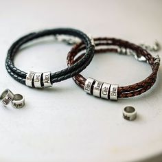 Introducing the perfect gift for any proud dad - our personalized leather bracelet! Handcrafted with premium leather and adorned with sleek silver beads, this bracelet exudes a timeless, masculine charm. Each silver bead is intricately engraved with the names of your beloved kids, creating a heartfelt and meaningful keepsake. With its adjustable clasp, this bracelet ensures a comfortable fit for every wrist size. Showcasing the love and bond between a father and his children, this personalized l Personalized Adjustable Braided Bracelets For Father's Day, Personalized Adjustable Braided Bracelet For Father's Day, Custom Name Adjustable Jewelry, Leather Bracelet For Father's Day Gift, Leather Bracelet Gift For Father's Day, Father's Day Leather Strap Bracelet Gift, Father's Day Gift Bracelet With Leather Strap, Classic Adjustable Wristband For Father's Day, Personalized Silver Leather Bracelet