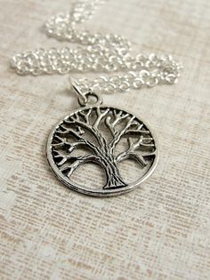 want Silver Tree Of Life Round Pendant Necklace, Symbolic Silver Necklace With Tree Of Life, Symbolic Hypoallergenic Silver Necklace, Antique Silver Necklace Gift, Antique Silver Necklace With Silver Chain As A Gift, Silver Tree Of Life Necklace For Jewelry Making, Symbolic Silver Cadmium-free Charm Necklace, Cadmium-free Silver Round Charm Necklace, Rowan Tree