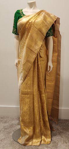 Beautiful Kanchi Silk in Gold Saree W/ Custom Blouse. For Custom Blouse Pls contact us. Free Shipping within the US. Saree ships immediately within the US and the Blouse 2 weeks later. Custom blouse stitching $35. Work blouse available for $99, which shown in the picture. Gold Saree, Blouse Stitching, Work Blouse, The Picture, Contact Us, Stitching, Saree, Ships, Silk