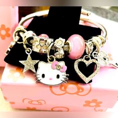 I Have An Adorable Silver Tone Hello Kitty Bangle, Nwt! It Has Beautiful Charms And Adjustable To Your Size. It Comes With Its Original Box! Smoke Free Home All Sales Are Final! Thank You For Your Interest! Cute Metal Charm Bracelet, Adjustable Hello Kitty Jewelry, Silver Hello Kitty Kawaii Jewelry, Kawaii Silver Hello Kitty Jewelry, Kawaii Hello Kitty Silver Jewelry, Cute Silver Charm Bracelet For Party, Trendy Silver Jewelry With Cat Design, Silver Kawaii Jewelry With Cat Design, Cute Silver Bracelets With Charms