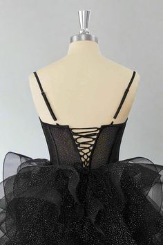 Experience the perfect balance of elegance and style with our Black Straps A-Line Ruffle Homecoming Dress. Featuring delicate spaghetti straps, a flattering corset bodice, and a gorgeous a-line tiered skirt, this dress will make you stand out at any event. The lace-up back adds a touch of sophistication, making it the perfect choice for any special occasion. ♡ SKU: FV12831 ♡ Fabric: Tulle ♡ Silhouette: A-Line ♡ Back Style: Lace-Up ♡ Embellishment: Ruffles ♡ Length: Above Knee ♡ Fully lined & Bui Tulle Wedding Dress Mermaid, Velvet Homecoming Dress, Feather Homecoming Dress, Floral Homecoming Dresses, Feather Prom Dress, Bodycon Dress Homecoming, Sweetheart Homecoming Dress, Ruffle Prom Dress, One Shoulder Prom Dress