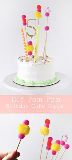 a cake topper that is made to look like pom poms