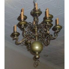 a chandelier hanging from the ceiling in a room