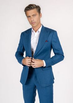 The Hudson Marine Blue Linen Suit is the perfect expression of summer luxury. Crafted from 100% linen in a vibrant marine blue hue, this custom suit will make an elegant statement wherever you wear it. Perfect for hot summer days, its lightweight fabric will keep you looking sharp while feeling cool and comfortable. Blue Linen Suit For Work, Blue Linen Suit For Workwear, Elegant Blue Summer Suits, Luxury Tailored Suits For Summer, Blue Linen Business Blazer, Blue Linen Blazer For Business, Luxury Tailored Summer Suits, Blue Linen Blazer For Semi-formal Occasions, Tailored Blue Linen Suit