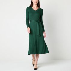 Look chic for a holiday party or soiree in this Studio 1 women's fitted sweater midi dress. Made from a fine green knit with a pleated texture, it has a v-neckline, 3/4 sleeves, a belted waist and a flared hem. Wear it with pumps and your favorite fine jewelry. Features: BeltedClosure Type: Pullover HeadNeckline: V NeckSleeve Length: Long SleeveSleeve Style: Fitted SleeveApparel Length: 46 InchesDress Length: Midi LengthFiber Content: 78% Rayon, 22% PolyesterFabric Description: KnitCare: Dry Fla Green Solid Color Midi Dress For Party, Elegant Green Midi Dress For Fall, Elegant Green Dress For Fall, Elegant Green Dresses For Fall, Elegant Green Fall Dress, Holiday Green Long Sleeve Maxi Dress, Elegant Green Maxi Dress For Fall, Formal Green Maxi Dress For Fall, Knee-length Midi Dress For Winter Night Out