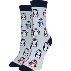 Penguin socks for women. Featuring cute penguins dressed up in hats and scarves for cold weather. These women's penguin socks are a great way to add a pop of color to any outfit. Winter Stocking Stuffer Socks, Casual Socks For Gift, Casual Socks As Gift For Fall, Casual Socks As A Gift For Fall, Trendy Blue Socks For Winter, Trendy Winter Socks, Casual Socks For Fall Gift, Trendy Blue Winter Socks, Casual Socks For Fall