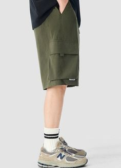 Experience functionality and style with our Cargo Utility Shorts, complete with a zippered pocket for the modern man on the go. Crafted from a breathable blend of 90% nylon and 10% spandex, these shorts feature a low waist, loose straight fit, and ice silk quick-drying properties for ultimate comfort. The edgy design includes a durable dual-duty stitch, ample storage with a large utility pocket, and a classic straight-cut hem for a relaxed silhouette. Versatile and comfortable, these shorts are Sporty Bermuda Bottoms With Built-in Shorts, Sporty Cargo Shorts With Built-in Shorts, Relaxed Fit Nylon Cargo Shorts With Pockets, Relaxed Fit Nylon Cargo Shorts, Short Nylon Cargo Pants For Summer, Cotton Athletic Shorts For Outdoor, Outdoor Cotton Athletic Shorts, Summer Nylon Short Cargo Pants, Utility Bermuda Shorts With Side Pockets