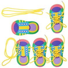 four pairs of shoes with yellow laces on them