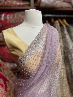 Mauve purple fabricated in net crafted with sequins, cut dana, mirror, pearl and silver zari embroidered saree. Available with unstitched blouse. Fabric: Net Ready to Ship! Purple Saree, Embroidered Saree, Mauve Purple, Blouse Fabric, Knitted Scarf, Saree, Mirror, Purple, Silver