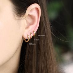 Our simple yet elegant iconic hoop earrings. Timeless and Classic, fits any outfit and any occasion. Made of 14K gold, open and close with a strong safe mechanism , simple and comfortable. Perfect for the everyday casual chic look, they can also be worn to top off an exquisite evening look. The earrings are sold as singles All of our jewelry is carefully handmade in our atelier To order by phone 972-72-2991000 Trendy 14k Gold Huggie Earrings, Luxury Dainty Small Hoop Huggie Earrings, Dainty Small Hoop Huggie Earrings For Everyday Luxury, Minimalist Huggie Hoop Earrings, Minimalist Diamond Hoop Earrings, Modern Round Huggie Earrings With Ear Wire, Trendy 14k Gold Hoop Earrings For Everyday, Tarnish Resistant Small Hoop Huggie Earrings For Everyday Luxury, Minimalist Small Hoop Huggie Earrings