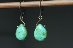 Turquoise Green Earrings Dangle Earrings Drop Earrings Czech Glass Earrings Small Earrings Birthday Gift for her Gift for women Color : Turquoise Green Picasso Beads - Czech Glass Beads - 16x12mm Teardrop Finish : Antiqued Brass Size : Approx 1,5 inches including the antiqued brass lever backs Ear wires : Antiqued brass lever backs Available in deep red : https://www.etsy.com/listing/485739803/red-earrings-czech-glass-drop-earrings?ref=shop_home_active_19 Glass Earrings section : https://www.ets Turquoise Jewelry Earrings, Glass Drop Earrings, Color Turquoise, Turquoise Green, Red Earrings, Earrings Drop, Green Earrings, Birthday Gift For Her, Small Earrings