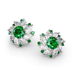 Beautifully crafted, this stunning style is sure to become a treasured keepsake. Inspired by ballerina's dancing dress, each earring features a shimmering round stone shines brightly at the center. Marquise cut stones and green round stones wrap the centerpiece in a sparkling embrace. Whether you are looking for a daily go to accessory or a perfect piece for that special occasion, this is the style for you. Carat Weight: 4.82 ctStone Size: 7 mmStone Type: Jeulia® StoneNumber of Stones: 2 Stone C Diamond Chandelier Earrings, Kay Jewelry, Birthday Jewelry, Cut Earrings, Womens Earrings Studs, Halo Earrings, Halo Earrings Studs, Flower Stud Earrings, Sterling Silver Stud Earrings