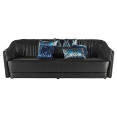 a black leather couch with blue pillows on the top and bottom, in front of a white background