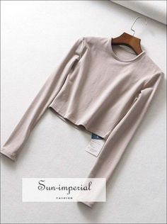 Material:COTTON Material:Spandex Style:Casual Fabric Type:Jersey Sleeve Length(cm):Full Decoration:None Clothing Length:Short Pattern Type:Solid Collar:O-Neck Sleeve Style:REGULAR Gender:Women Item Type:Tops Tops Type:Tees Size Table S : Shoulder 34cm(13.4") Bust 72-82cm(28.3"-32.3") Sleeve 59cm(23.2") Length 40cm(15.7") M : Shoulder 35cm(13.8") Bust 76-86cm(29.9"-33.9") Sleeve 60cm(23.6") Length 41cm(16.1")L : Shoulder 36cm(14.2") Bust 80-90cm(31.5"-35.4") Sleeve 61cm(24") Length 42cm(16.5") th Solid T Shirt, Estilo Hipster, Crop Tops For Women, Layer Shirt, Yoga Long Sleeve, Short Design, Elastic Shorts, Solid Clothes, Active Wear Outfits