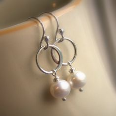 Pearl earrings whtie freshwater pearls eternity by KGarnerDesigns, $18.00 rings = 9mm, pearls 6mm Pearl Bridesmaid Jewelry, Silver Eternity Ring, Bridesmaid Pearl Earrings, Freshwater Pearl Drop Earrings, Earrings Circle, Bridesmaid Pearls, Eternity Rings, Bridesmaid Gifts Jewelry, Earrings Bridesmaid