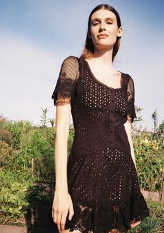 Unapologetically feminine. Cotton eyelet patchwork, crochet-style sleeves and trims, and a super-flattering fit, Ori dress is what dreams are made of. FINAL SALE Details and fit -Fully lined -Scoop neckline, front buttons are decorative -Closes with zip on back -Model wears XS -100% COTTON Fitted Mini Dress With Lace Short Sleeves, Fitted Mini Dress With Lace Sleeves, Fitted Crochet Dress With Lace Patchwork, Mini Length, Fitted Crochet Mini Dress With Lace Patchwork, Spring Crochet Dress With Square Neck, Fitted Dress With Cutwork Hem For Daywear, Fitted Eyelet Midi Dress, Fitted Eyelet Dress, Midi Length, Fitted Eyelet Dress Midi Length