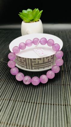 KUNZITE Round Bracelet SHAPE :- ROUND  STRECH CORD BRACELET We take order work as well. Feel free to contact for purchasing goods in bulk. We are Wholesaler & manufacturers of semi-precious & precious gemstones, Loose Gemstones Beads, Cabochons. Measurements & weight are close approximations Round Crystal Bracelet With Natural Stones, Round Amethyst Bracelets With 8mm Beads, Amethyst Bracelets With 8mm Beads, Amethyst Beaded Bracelets With 8mm Beads, Round Bracelet, Cord Bracelet, Cord Bracelets, Precious Gemstones, Gift Registry