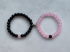 Matching Black and Pink Bracelets for couples, friends and family!! Comes with a connecting heart magnet to join the bracelets together! Perfect as a cute gift🫶🏼 Magnetic Bracelets For Couples, Black Heart-shaped Couples Bracelets, Couples Black Heart Bracelets, Couples Black Heart-shaped Bracelets, Matching Friend Bracelets, Black And Pink Bracelet, Black Couples Bracelets For Best Friend Gift, Black Heart Bracelet For Couples And Friendship, Black Heart Bracelet For Couples Friendship