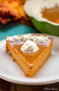 a slice of pumpkin pie on a white plate