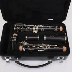 an open case with four flutes in it