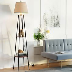 a living room scene with focus on the floor lamp and sofa in the foreground