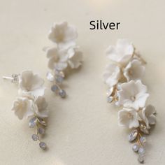 Product information : Material: ceramics Modeling: flowers Crystal type: white crystal Color: a pair of silver, a pair of gold Size Information: Length: 4-5cm Packing list: A pair of earrings White Crystal, European Style, European Fashion, Handmade Earrings, Packing List, Opal, Ceramics, Crystals, Flowers