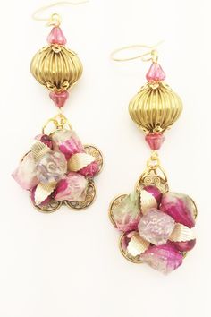 "A lovely set of earrings that reflect a retro / vintage time.  These are made from a vintage pair of clip on earrings and embellished with vintage components.    These have an elegant and classy look and feel.  These will arrive beautifully packaged and ready for gift giving if desired.  Measurements:  Length, not including ear wire is 2-3/4\" long Width - 1\" at widest point" Vintage Dangle Clip-on Earrings For Gift, Vintage Dangle Metal Earrings, Vintage Metal Flower Earrings For Gift, Handmade Retro Metal Earrings, Handmade Metal Retro Earrings, Vintage Gold Flower Earrings For Gift, Vintage Metal Chandelier Earrings For Festive Occasions, Festive Vintage Brass Earrings, Vintage Festive Metal Chandelier Earrings