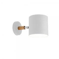 a white wall light with a wooden arm