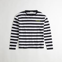 Get on board: this Long Sleeve T-Shirt is a classic design with a regular all-gender fit crafted with 97% recycled cotton made from pre-consumer cotton waste. This version comes in a nautical-but-nice stripe pattern. | Coachtopia Long Sleeve T-Shirt With Stripe Pattern Size Small - Black/creme Cheap Blue Horizontal Stripe T-shirt, Sailor Style Cotton Crew Neck Top, Striped Tops For Streetwear, Crew Neck Cotton Top With Signature Stripes, Striped Sailor Long Sleeve Top, Nautical Cotton Crew Neck Top, Cotton Nautical Crew Neck Tops, Sailor Style Striped Long Sleeve Top, Sailor Style Striped Cotton Top