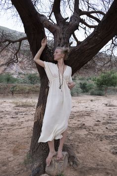 Unique Ahimsa silk dress in Cream beige/pale yellow colour is made from non violent type of wild silk. It can be worn perfect as day beach to evening dress. Soft and light has only one breathable layer of pure Ahimsa silk fabric. Will look perfect with light colour underwear or swimsuit to avoid transparency. Two strings on each side of the bust make it perfectly adjustable for your body shape and size. Perfectly fitting sizes from S to M. V neck opening on in front and back and cuts on the side Silk Kaftan Dress, Raw Silk Dress, Bohemian Wear, Pure Silk Dress, Beige Crop Tops, Boho Dresses Long, Nature Dress, Silk Kaftan, Silk Outfit